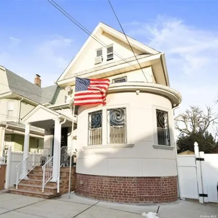 Buy this 5 bed house on 92-11 107th Street in New York, NY 11418