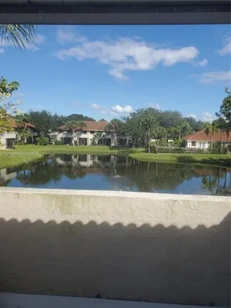 Rent this 2 bed condo on 3201 Coral Lake Drive in Coral Springs, FL 33065