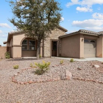 Rent this 3 bed house on East Mountain Falls Parkway in Manse, Pahrump