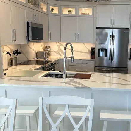 Rent this 3 bed condo on Naples