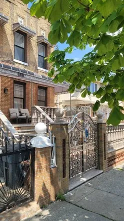 Buy this 7 bed house on 119 Lott Avenue in New York, NY 11212