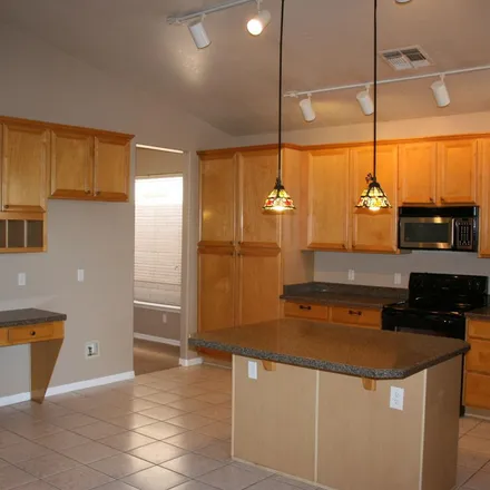 Rent this 4 bed apartment on 4327 East Morning Vista Lane in Phoenix, AZ 85331
