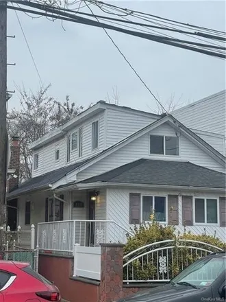 Buy this 3 bed house on 145-70 220th Street in New York, NY 11413