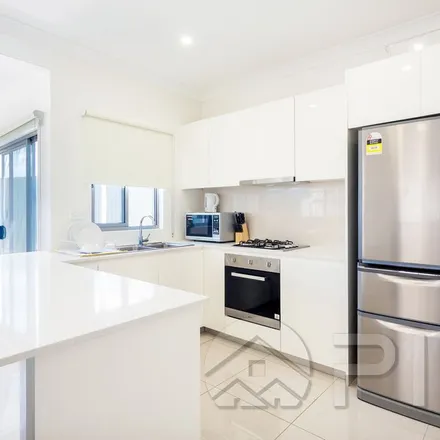 Rent this 5 bed apartment on Barinya Street in Villawood NSW 2163, Australia