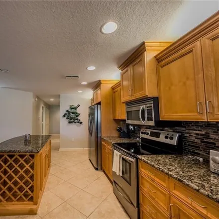 Image 9 - 8558 Via Garibaldi Circle, Shadow Wood, Lee County, FL 33928, USA - Condo for sale