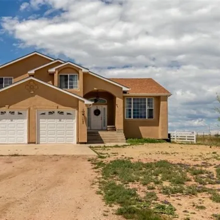 Buy this 4 bed house on 1701 Buckboard Lane in Pueblo County, CO 81007
