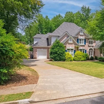 Buy this 6 bed house on 3920 Laurel Grove Trace in Gwinnett County, GA 30024