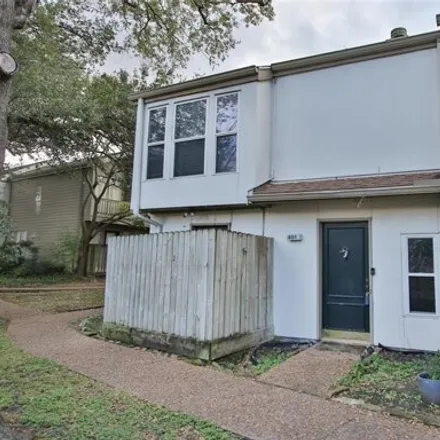 Rent this 1 bed townhouse on Woodlake Lane in Houston, TX 77063