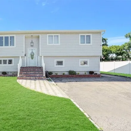 Rent this 3 bed house on 92 Orchard St in Lindenhurst, New York
