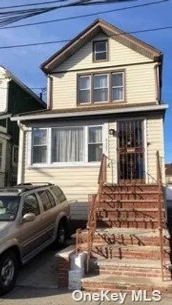 Buy this 3 bed house on 92-27 93rd Avenue in New York, NY 11421