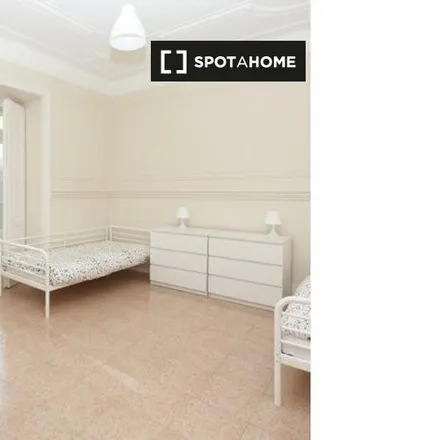 Rent this 6 bed room on Rua Marquês Sá da Bandeira 100 in 1050-150 Lisbon, Portugal