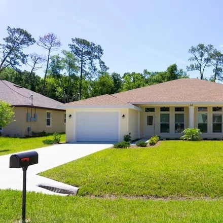 Image 1 - 64 Farmsworth Drive, Palm Coast, FL 32137, USA - Duplex for rent