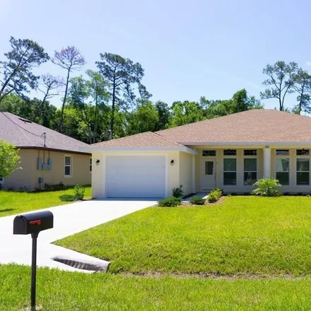 Rent this 2 bed duplex on 64 Farmsworth Drive in Palm Coast, FL 32137