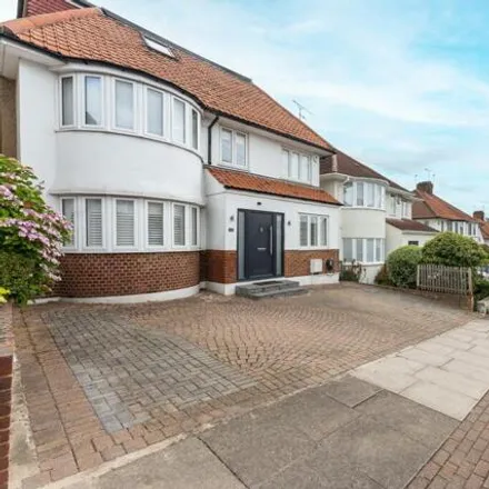 Buy this 4 bed house on Lawrence Avenue in London, NW7 4NN