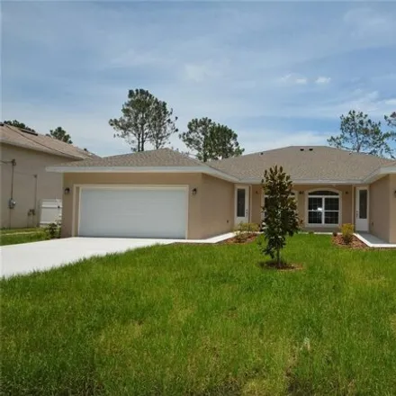 Rent this 4 bed house on 19 Buttonwood Lane in Palm Coast, FL 32137