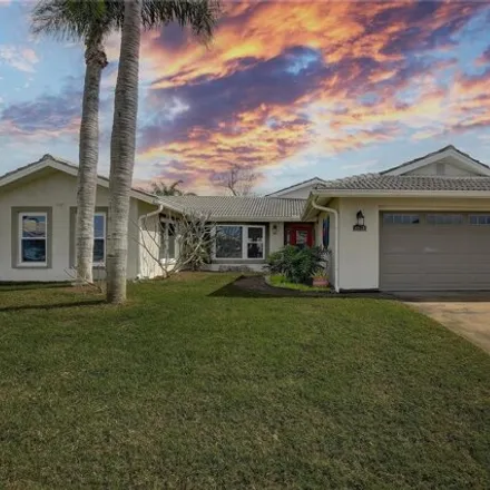 Buy this 4 bed house on 4928 Forecastle Drive in Elfers, FL 34652