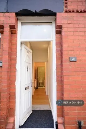 Rent this 3 bed townhouse on Castle Street in Middleton, M24 2AS