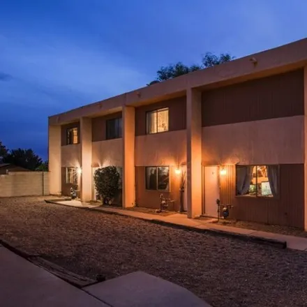 Buy this 8 bed townhouse on 12654 Copperwood Drive Northeast in Albuquerque, NM 87123