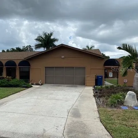 Buy this 4 bed house on 4715 7th Ave W in Bradenton, Florida