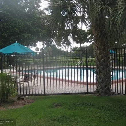 Rent this 2 bed condo on 9338 Southwest 8th Street in Sandalfoot Cove, Palm Beach County