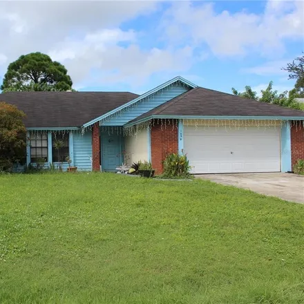 Buy this 3 bed house on 1959 Barker Street Northeast in Palm Bay, FL 32907