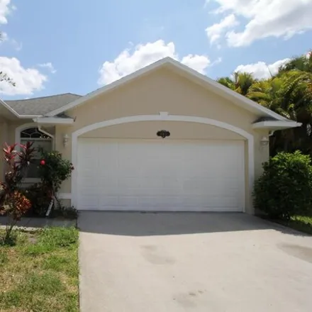 Rent this 3 bed house on 885 Tavernier Cir NE in Palm Bay, Florida