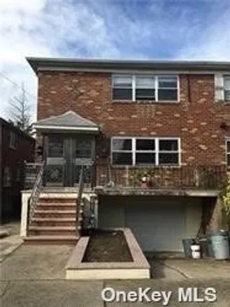 Rent this 3 bed house on 61-22 171st Street in New York, NY 11365