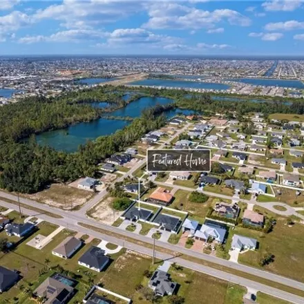 Image 9 - 917 Embers Pkwy W, Cape Coral, Florida, 33993 - House for sale