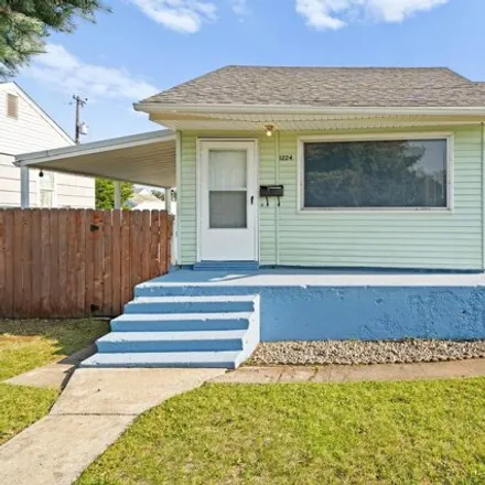 Buy this 4 bed house on 1224 E Hoffman Ave in Spokane, Washington