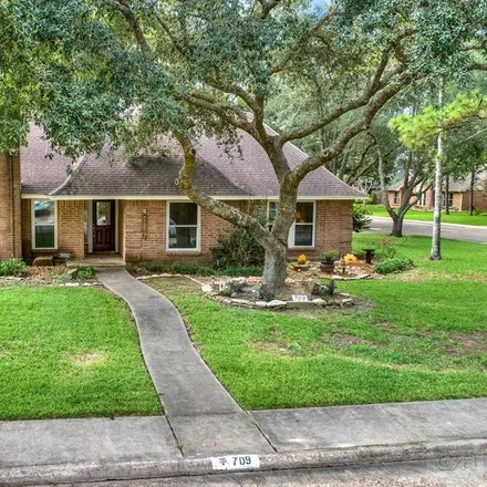 Buy this 4 bed house on 711 Olde Oak Drive in Dickinson, TX 77539