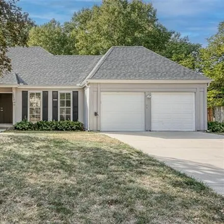 Buy this 4 bed house on 10246 Oakmont Circle in Lenexa, KS 66215