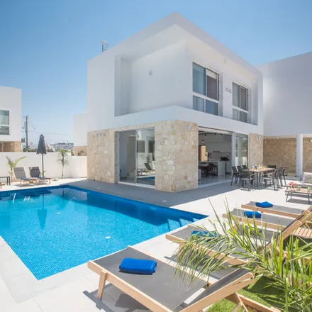 Rent this 4 bed house on Blue Island Villa in Efkleidou, 5296 Protaras