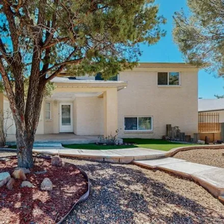 Buy this 4 bed house on 12242 Genoa Street Northeast in Albuquerque, NM 87111