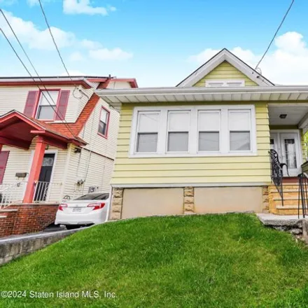 Buy this 4 bed house on 41 Eldridge Avenue in New York, NY 10302