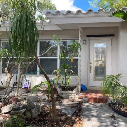 Rent this 3 bed house on 917 Northeast 11th Street in Fort Lauderdale, FL 33304