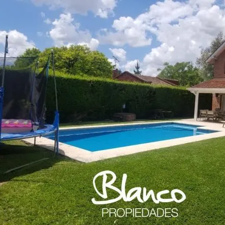 Buy this 4 bed house on unnamed road in La Lonja, 1631 Buenos Aires