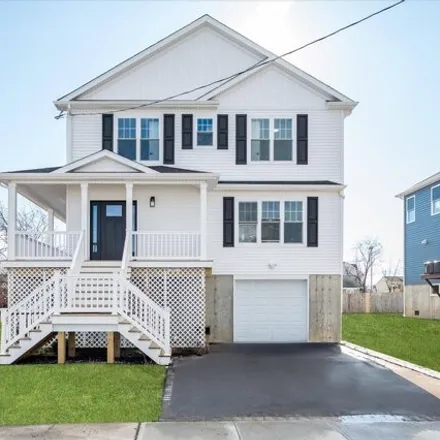 Buy this 4 bed house on Nautical Mile in 392 Guy Lombardo Avenue, Village of Freeport