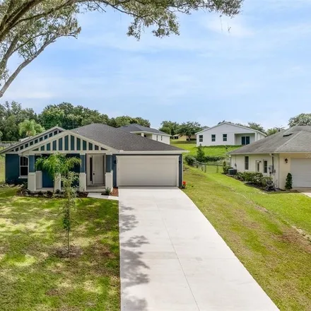 Buy this 4 bed house on 107 Hidden Oaks Drive in Lady Lake, FL 32159