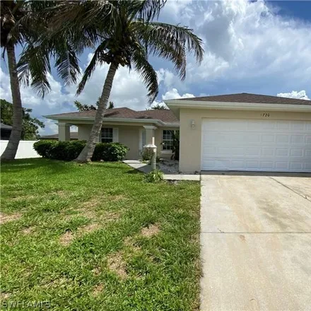 Rent this 3 bed house on 1720 NW 27th Ter in Cape Coral, Florida