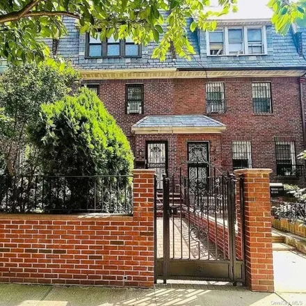 Buy this 5 bed house on 33-37 71st Street in New York, NY 11372