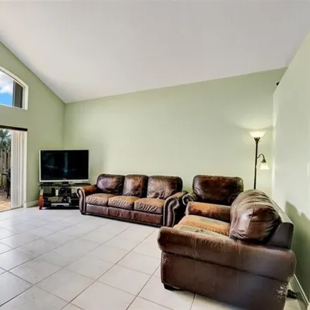 Buy this 4 bed house on 2457 Northwest 191st Avenue in Pembroke Pines, FL 33029