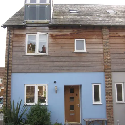 Rent this 4 bed townhouse on Wallands Park Rise in Lewes, BN7 1SE
