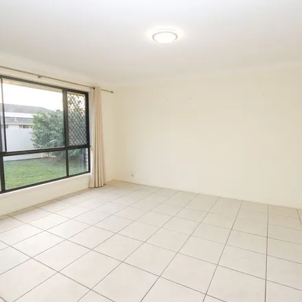 Rent this 4 bed apartment on Highcrest Circuit in Molendinar QLD 4214, Australia