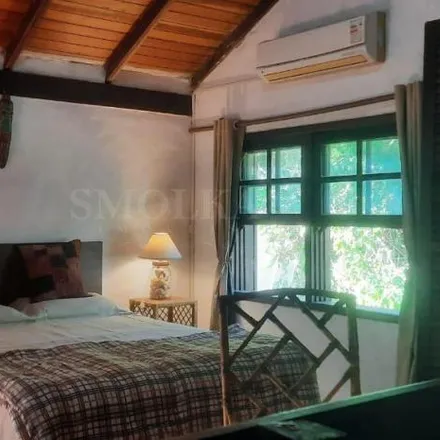 Buy this 6 bed house on Estrada Jornalista Jaime de Arruda Ramos in Ponta das Canas, Florianópolis - SC