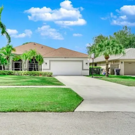 Rent this 4 bed house on Geranium Place in Wellington, FL 33414