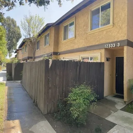 Buy this 3 bed condo on 12314 Cohasset Street in Los Angeles, CA 91605