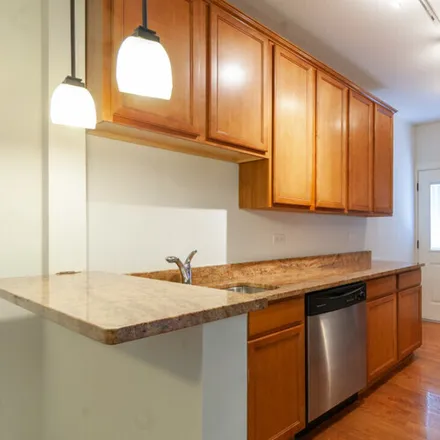 Rent this 2 bed apartment on 3437 N Lakewood Ave