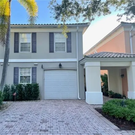Rent this 3 bed townhouse on 5663 Cove Circle in Collier County, FL 34119