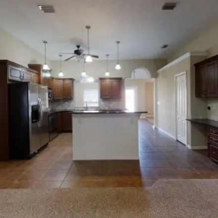 Buy this 4 bed apartment on 2080 Dixie Belle Avenue in Deltona Lakes, Deltona