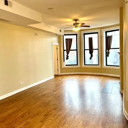 Rent this 4 bed apartment on 2445 West Harrison Street in Chicago, IL 60612